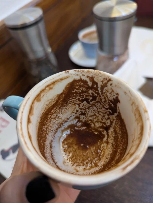 Φλιτζάνι με κατακάθια καφέ